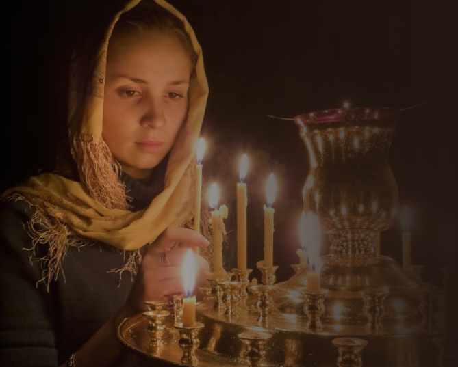Woman lighting candles